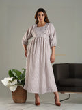 Yezwe striped maxi dress with three-quarter sleeves and square neckline worn by model