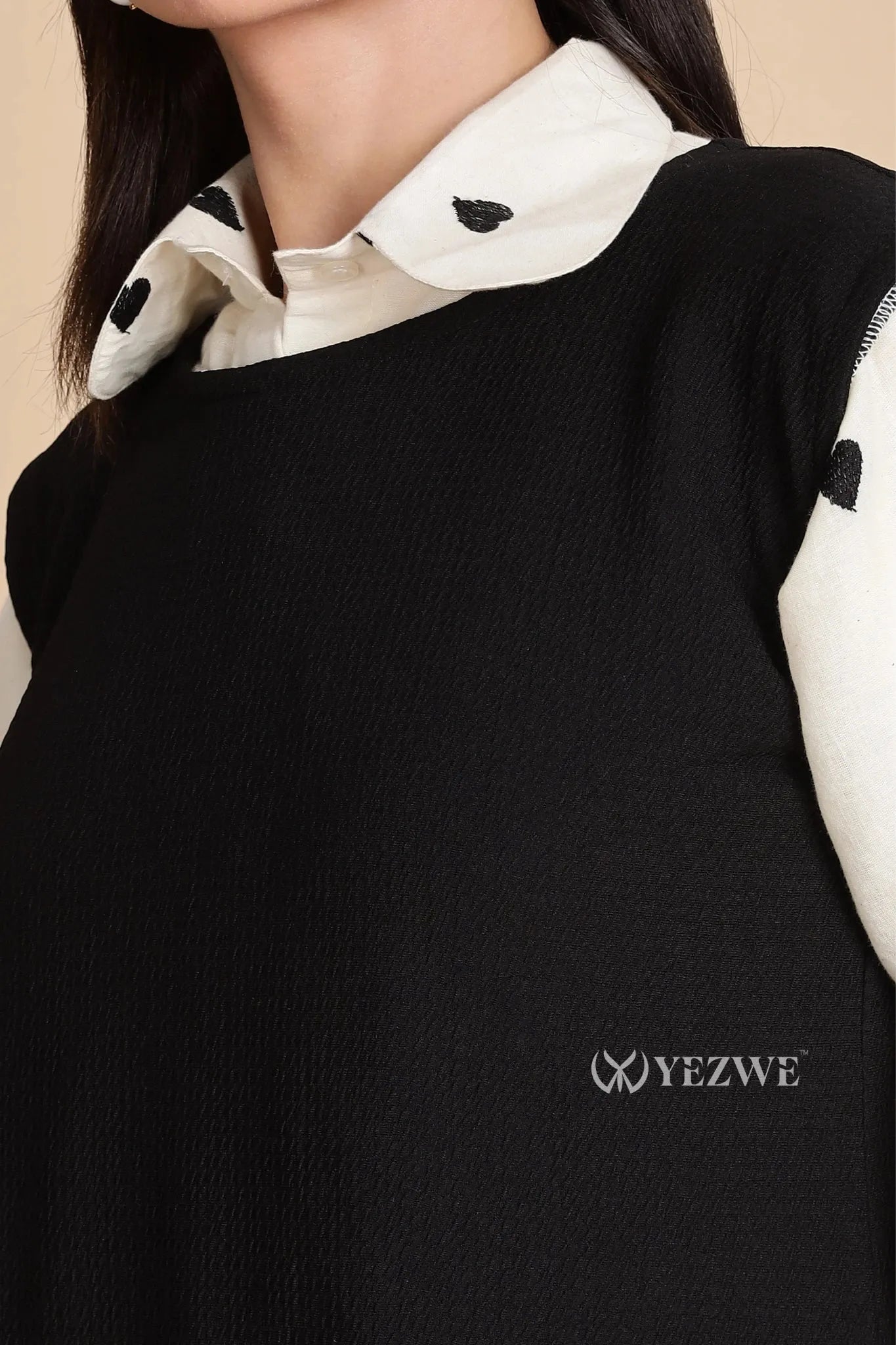 YEZWE modest black pinafore dress featuring a stylish, textured fabric and layered look
