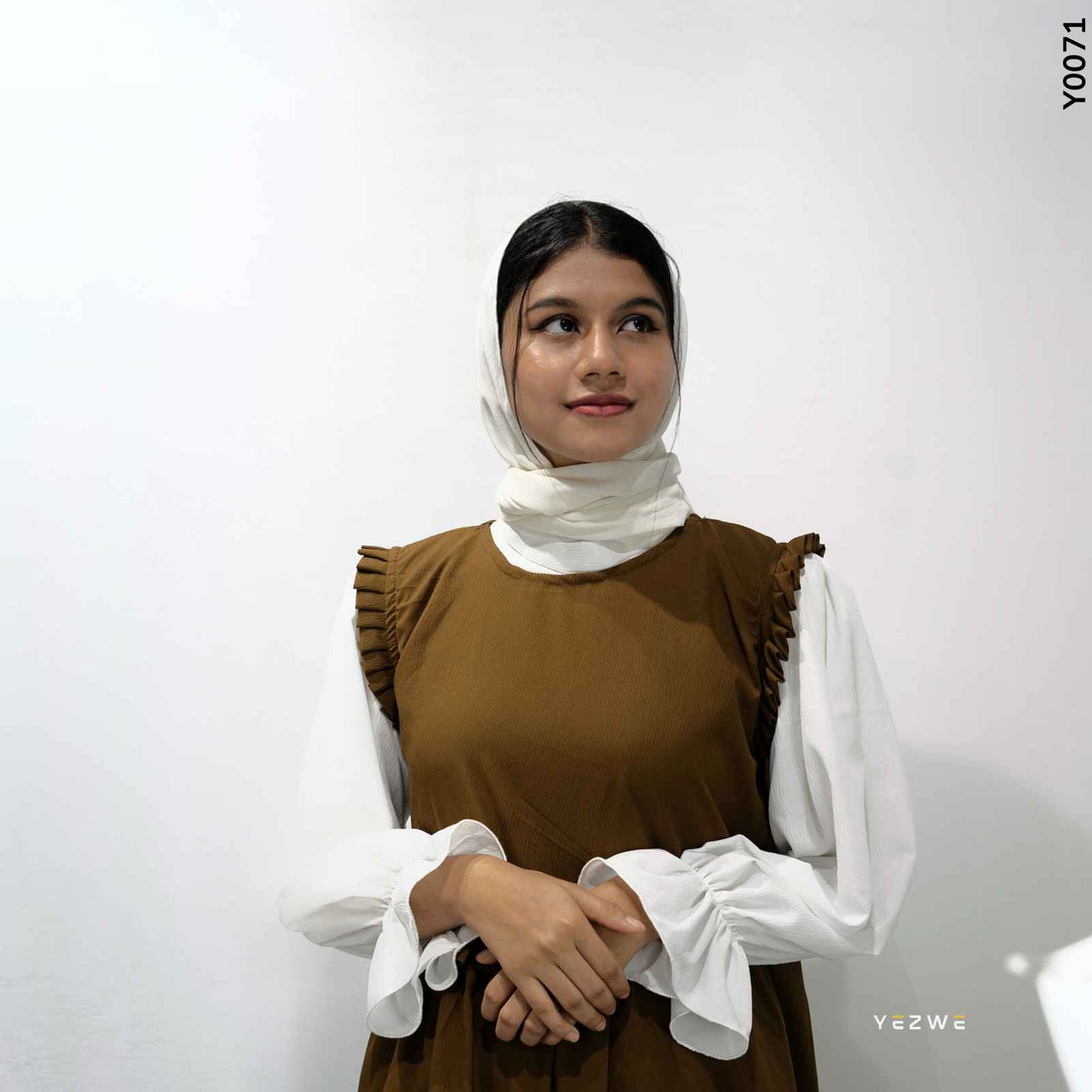 Modest brown dungaree outfit by Yezwe featuring ruffle detailing and long sleeves