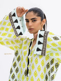 YEZWE Modest Co-ord Set with yellow and black patterns and detailed sleeve design on a model