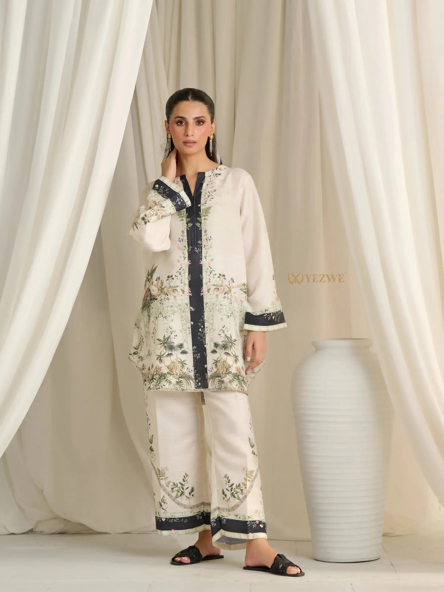 YEZWE Modest Co Ord Set with floral patterns in neutral tones featuring long sleeves and wide-leg pants