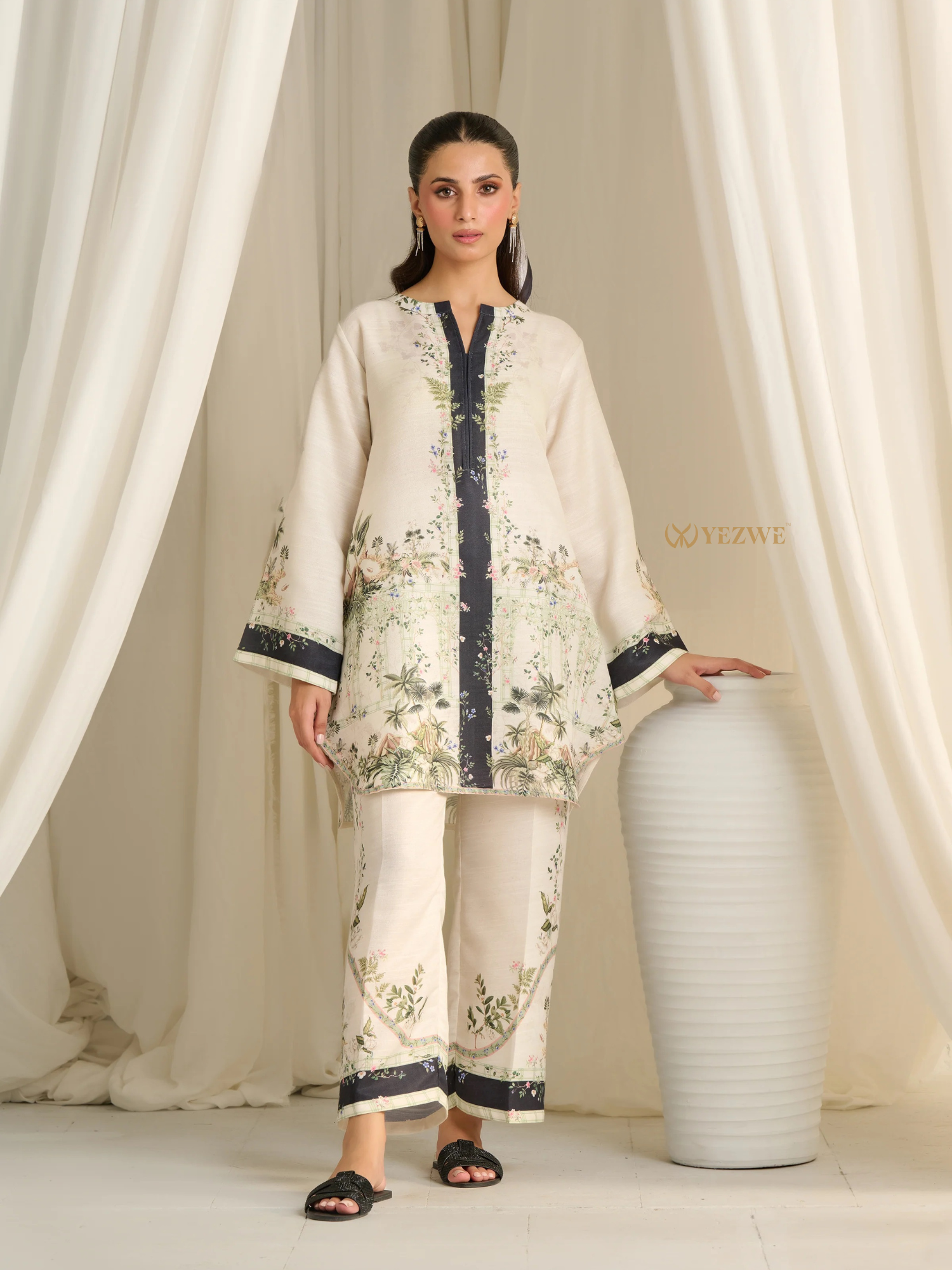 YEZWE modest Co Ord Set featuring a cream floral embroidered long top and matching pants with navy accents
