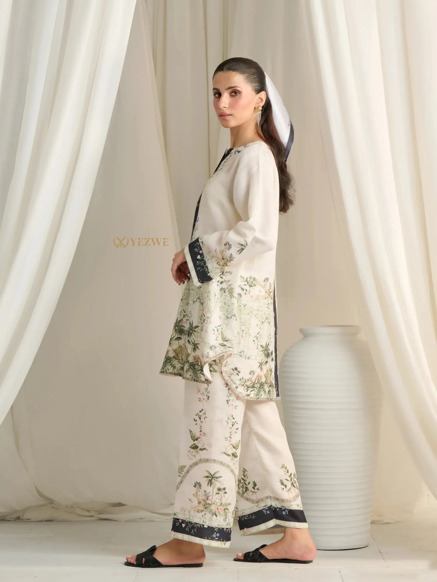 YEZWE Modest Co Ord Set in cream with floral embroidery and black accents worn by model