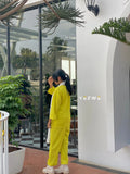 Bright yellow Yezwe modest fashion co-ord featuring a top and pants combination for a stylish look