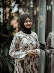 Yezwe modest floral maxi dress in soft tones with long sleeves and a flowing silhouette
