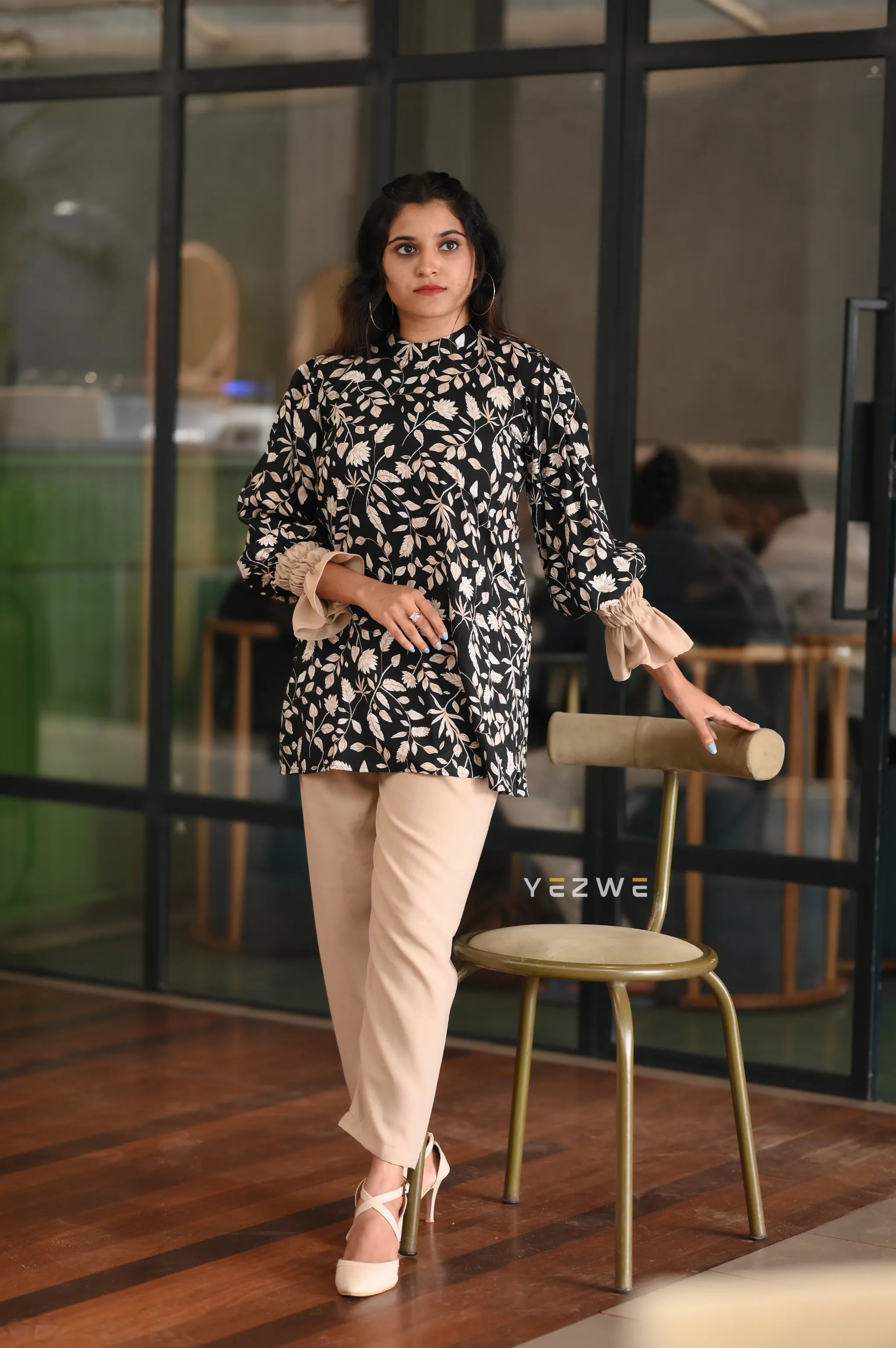 Modest floral print co-ord set featuring a stylish top and beige pants for a chic look