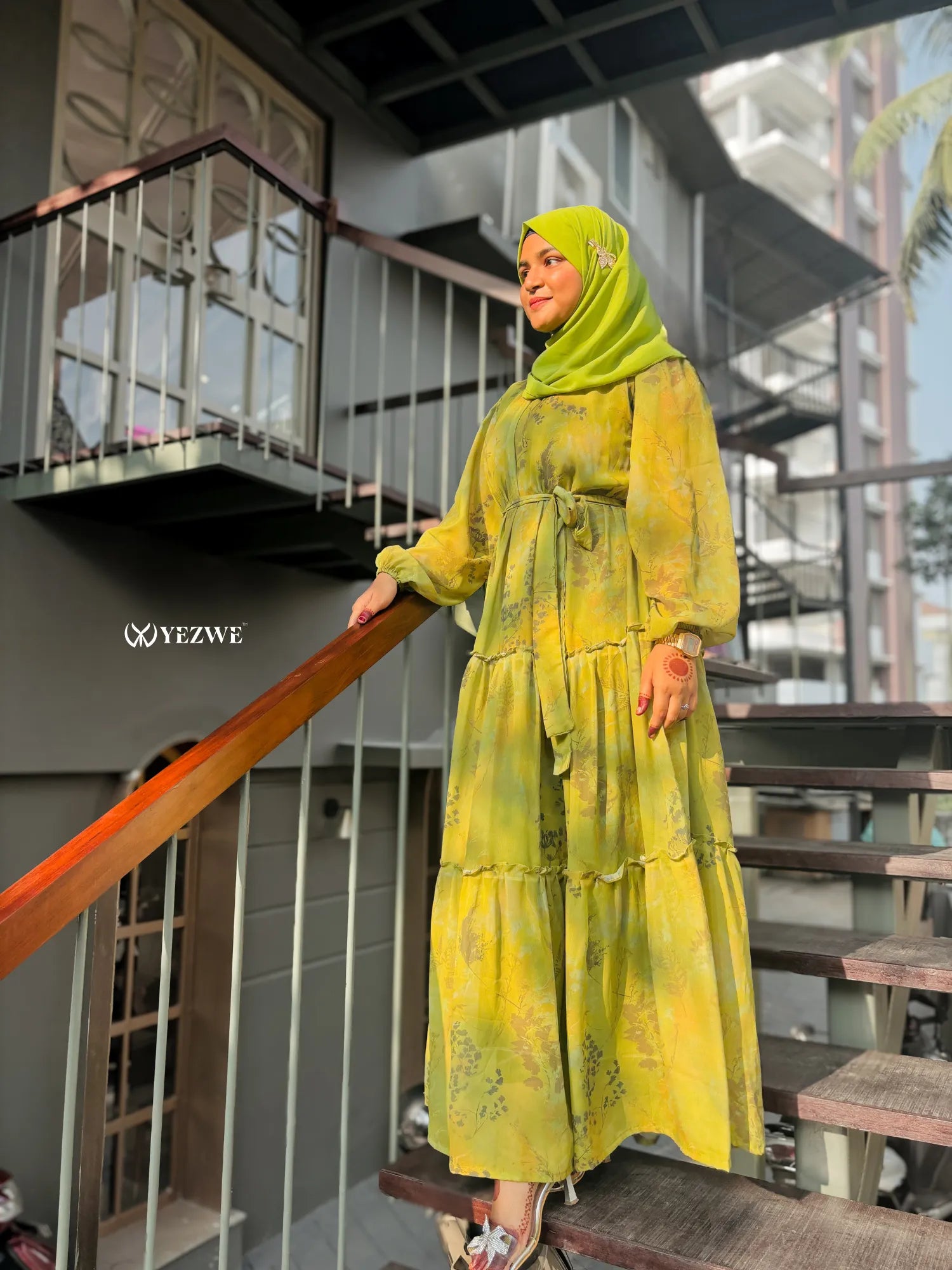 Modest green floral maxi dress by Yezwe featuring a flowing design and elegant tiered detail