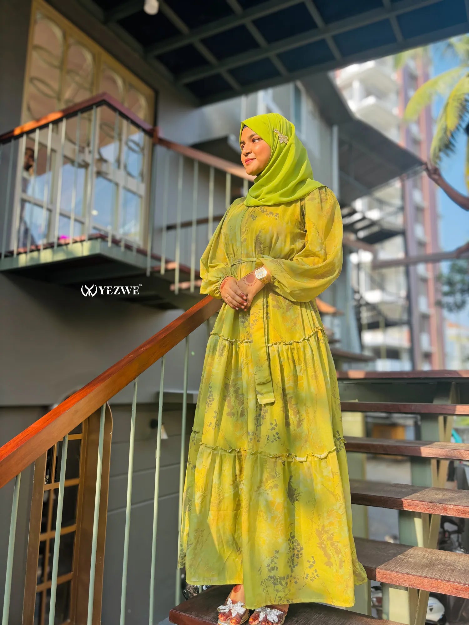 Modest green floral maxi dress by Yezwe with long sleeves and tiered design