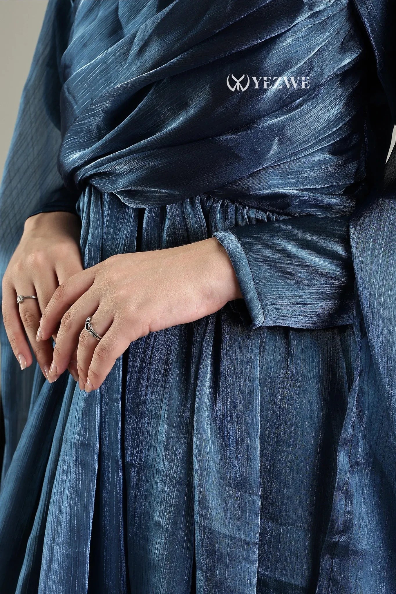 Elegant YEZWE modest in blue party maxi gown featuring flowing sleeves and a cinched waist