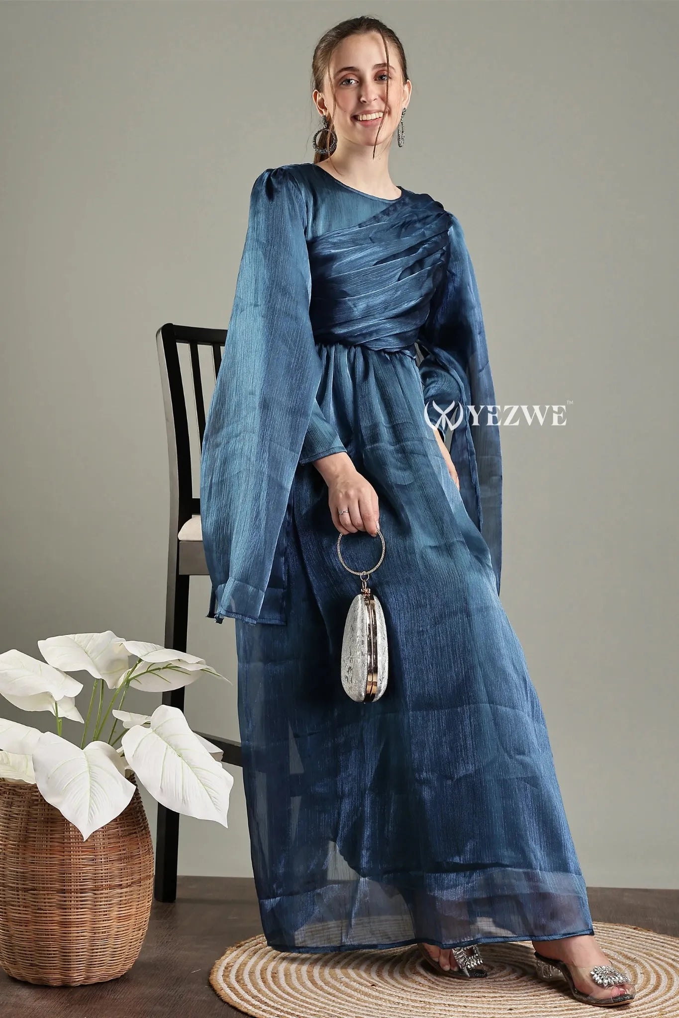 Modest in blue party maxi gown by YEZWE with elegant long sleeves and flowing silhouette