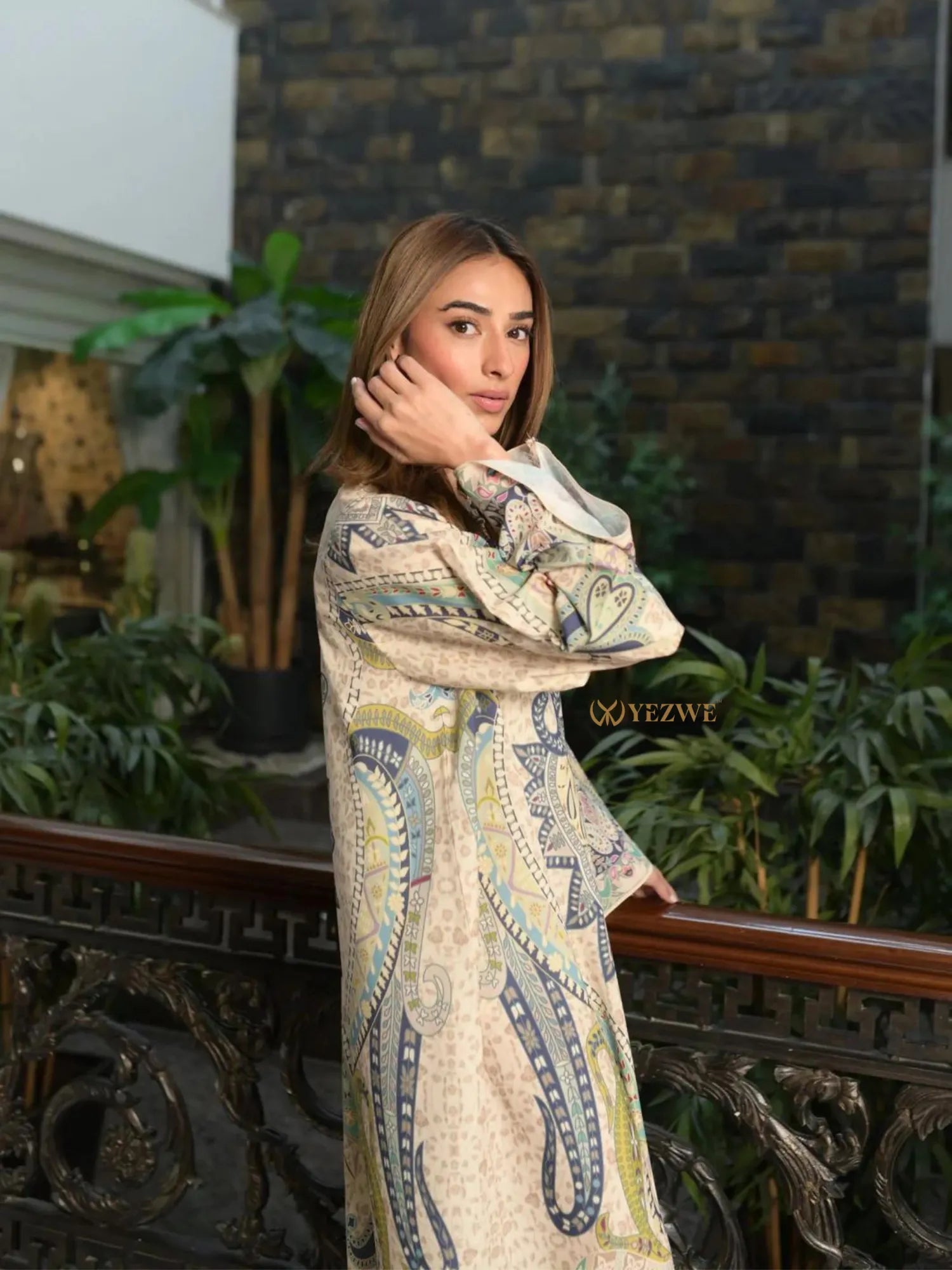 Yezwe Modest Kaftan Dress in neutral paisley print long sleeve tunic with relaxed fit modeled by woman