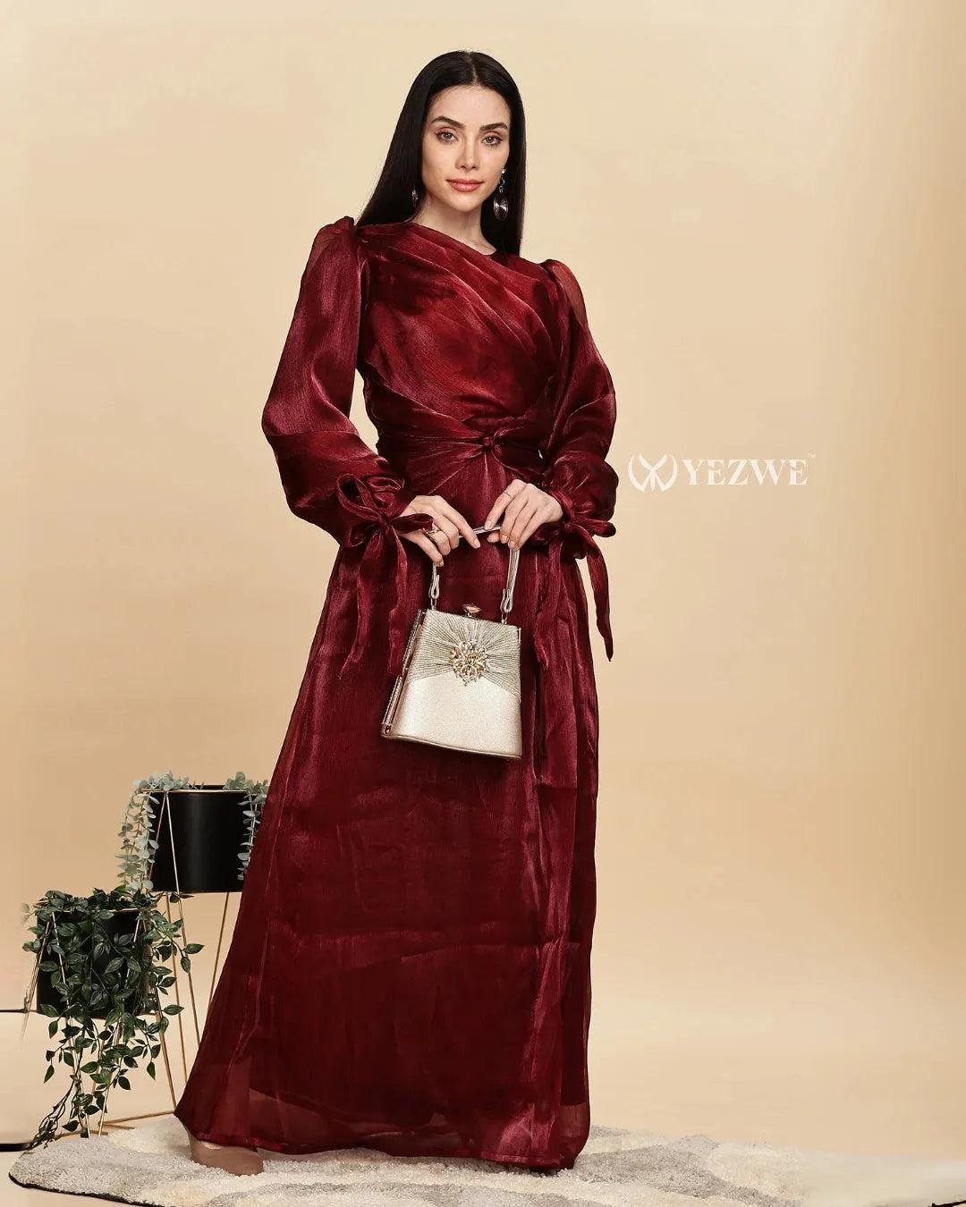 Elegant Yezwe modest maroon party gown with long sleeves and a stylish wrap design