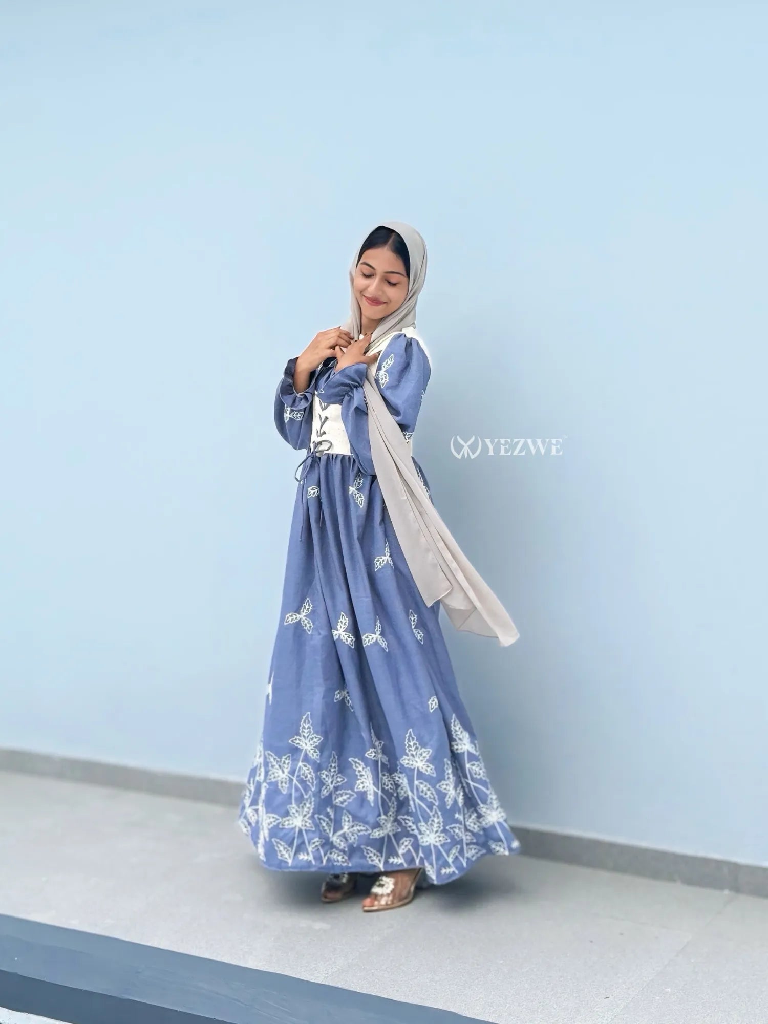 YEZWE Modest Maxi Dress in Blue with Floral Design and Flowing Skirt, Perfect for Elegant Occasions