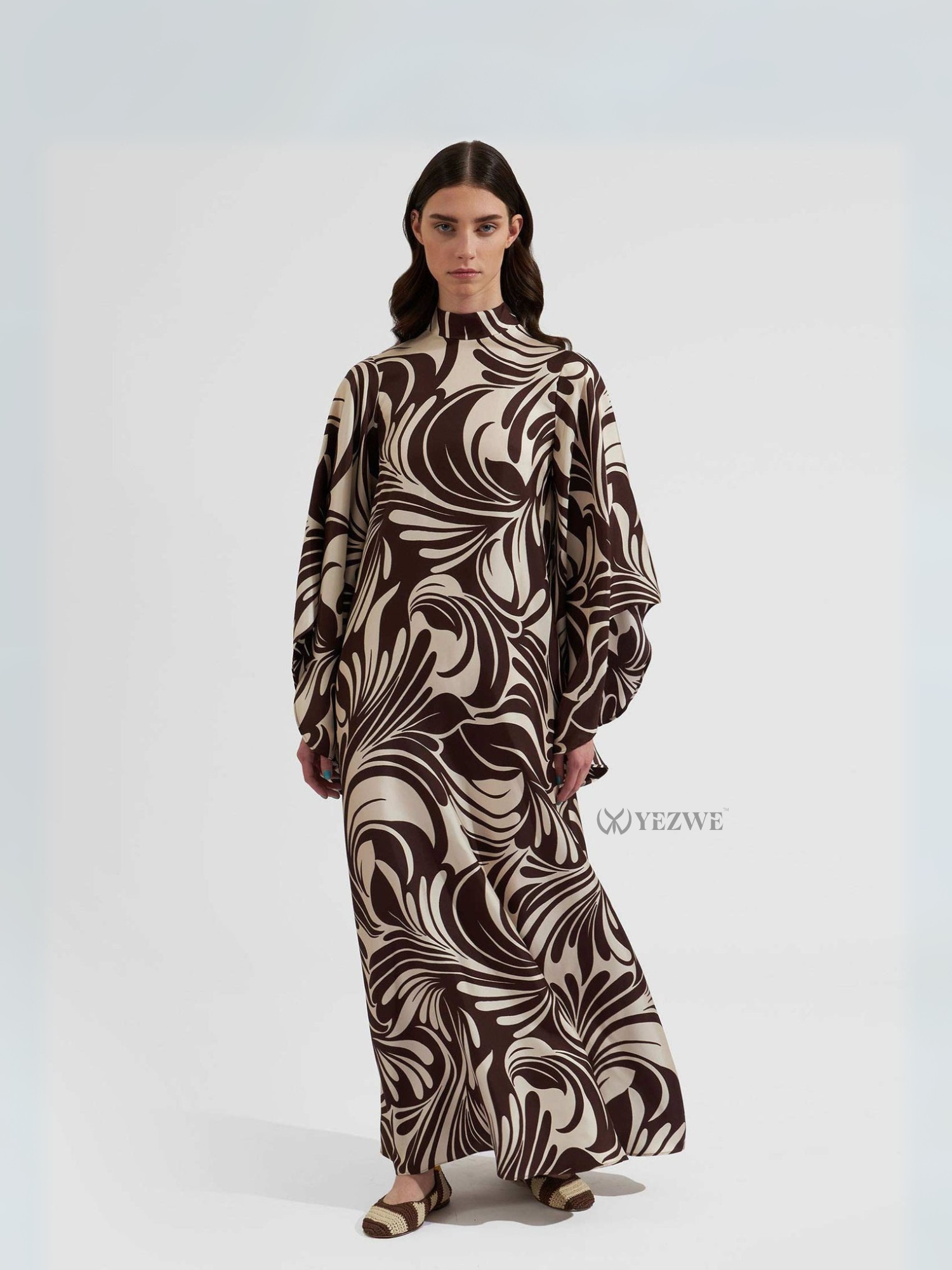 Yezwe modest maxi dress with abstract brown and cream swirl pattern and long sleeves