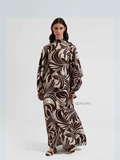 Yezwe modest maxi dress with abstract brown and cream swirl pattern and long sleeves