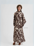 Yezwe modest maxi dress with brown and cream abstract swirl pattern and long sleeves