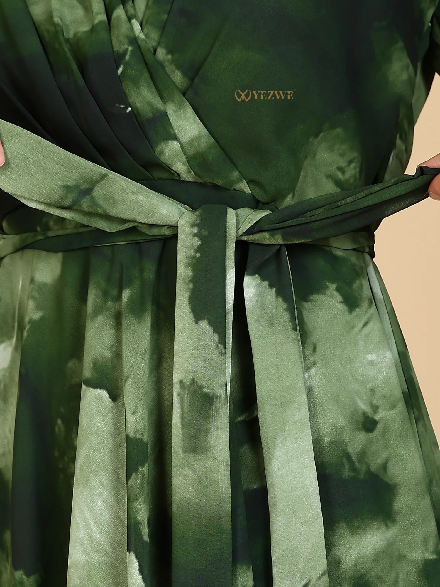 Yezwe Modest Maxi Dress green watercolor print with waist sash belt tied over pleated skirt