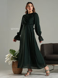 Yezwe modest maxi dress in dark green with long puffed sleeves and flowing skirt