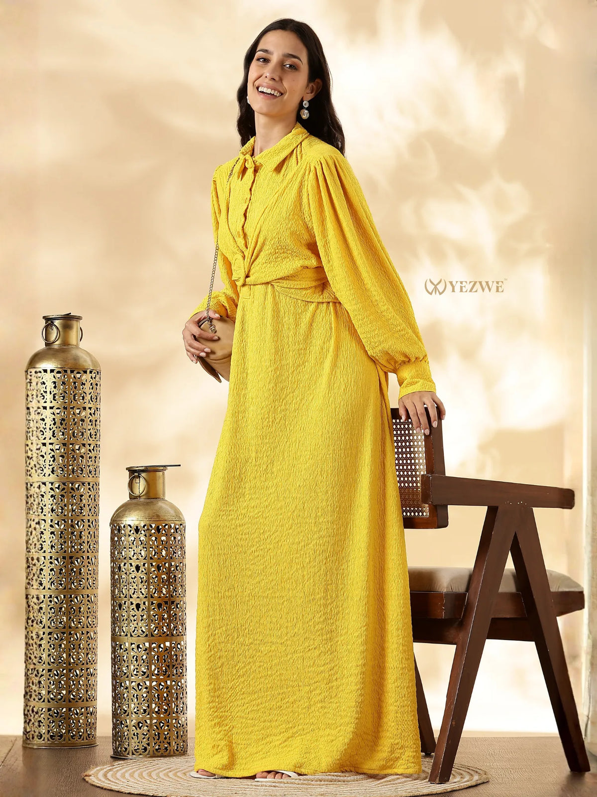 YEZWE Modest Maxi Dress in vibrant yellow with long sleeves and a stylish silhouette