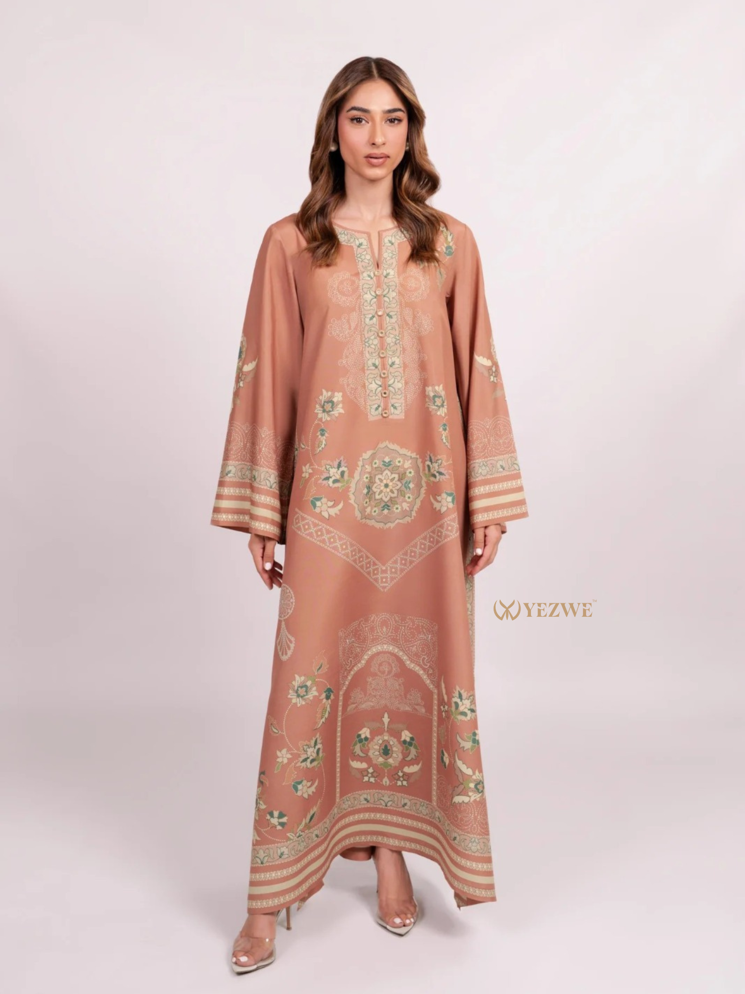 YEZWE Modest Maxi Top in soft peach with intricate floral embroidery and long sleeves