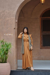 Modest mustard yellow maxi dress by Yezwe with elegant long sleeves and a flowing skirt