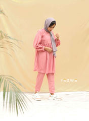 Modest pink co-ord set featuring a long top and matching pants for a stylish and comfortable look