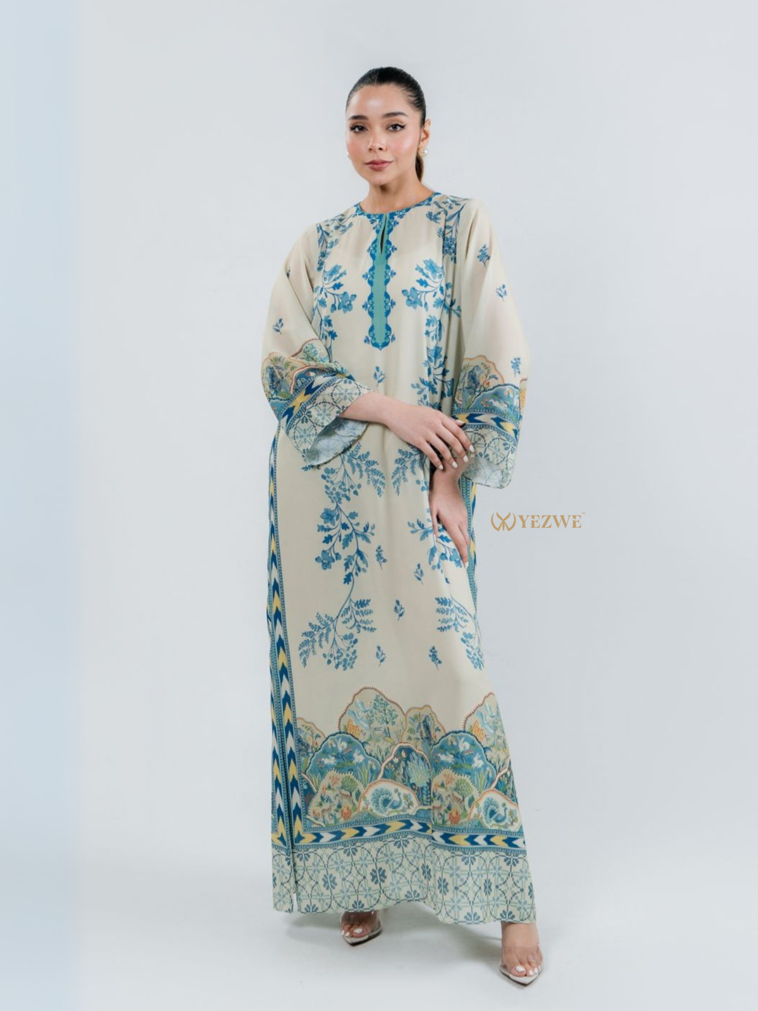YEZWE modest top with bottom co-ord set featuring long beige dress with blue floral prints