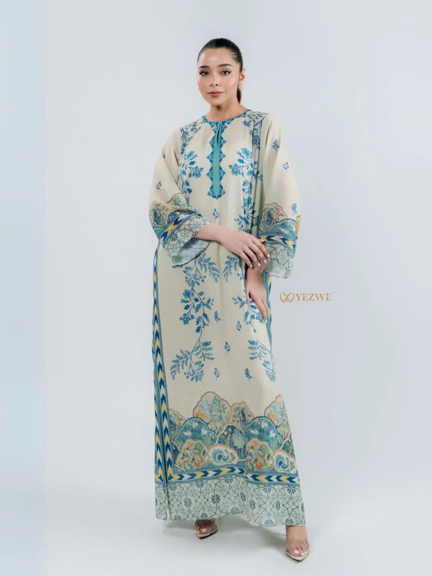 YEZWE modest top with bottom co-ord set featuring long beige dress with blue floral prints