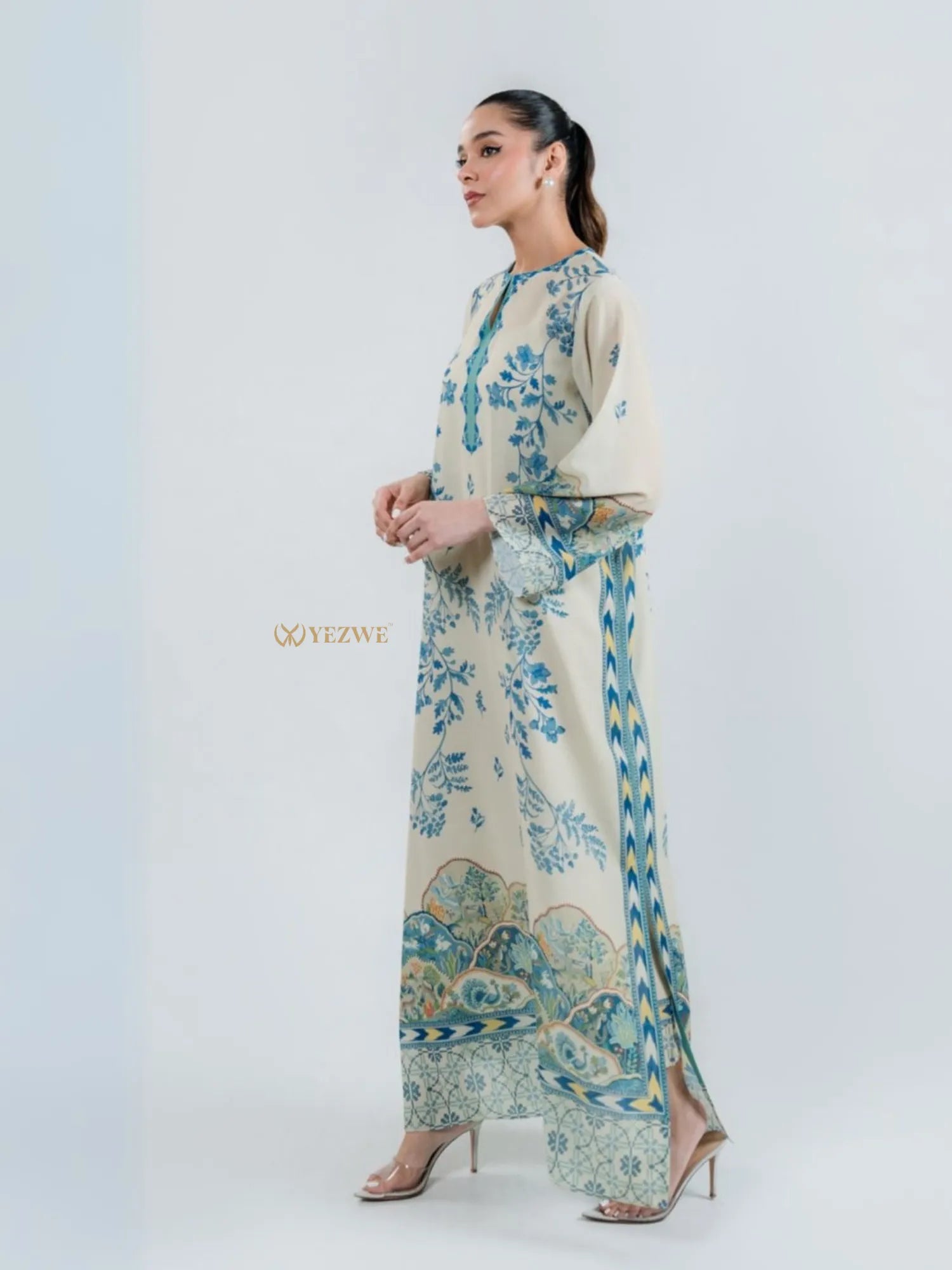 YEZWE modest top with bottom co-ord set featuring blue floral and geometric patterns on cream fabric