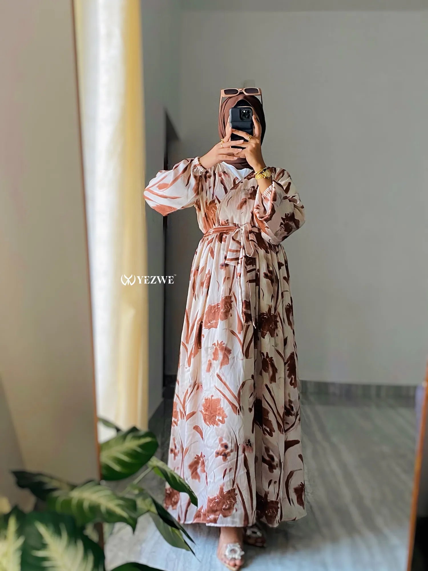 Yezwe modest V-neck dress with floral design and flowing silhouette, perfect for elegant occasions