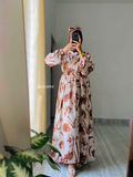 Yezwe modest V-neck dress with floral design and flowing silhouette, perfect for elegant occasions