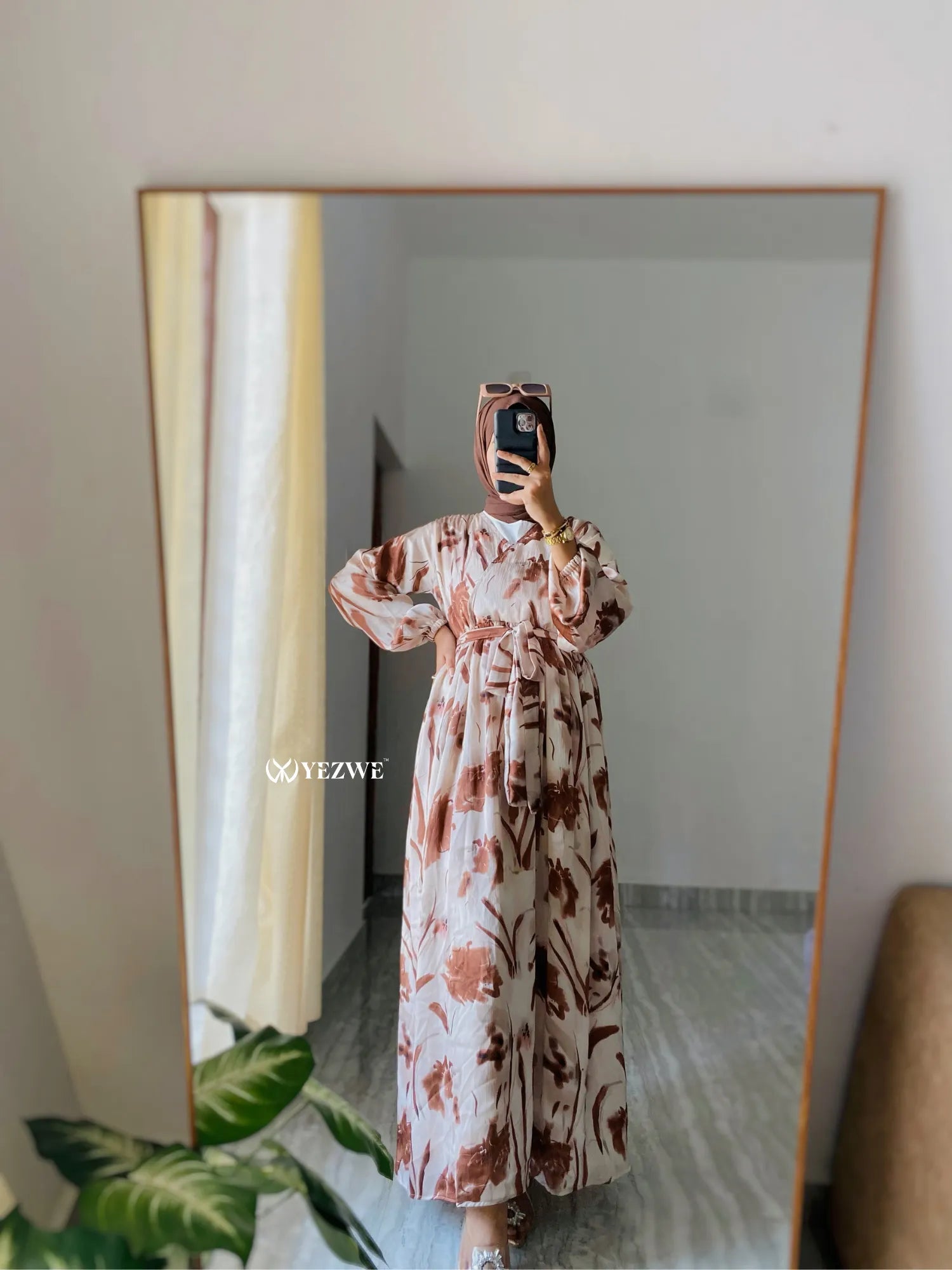 Yezwe modest V-neck dress with floral print and balloon sleeves in a full-length design