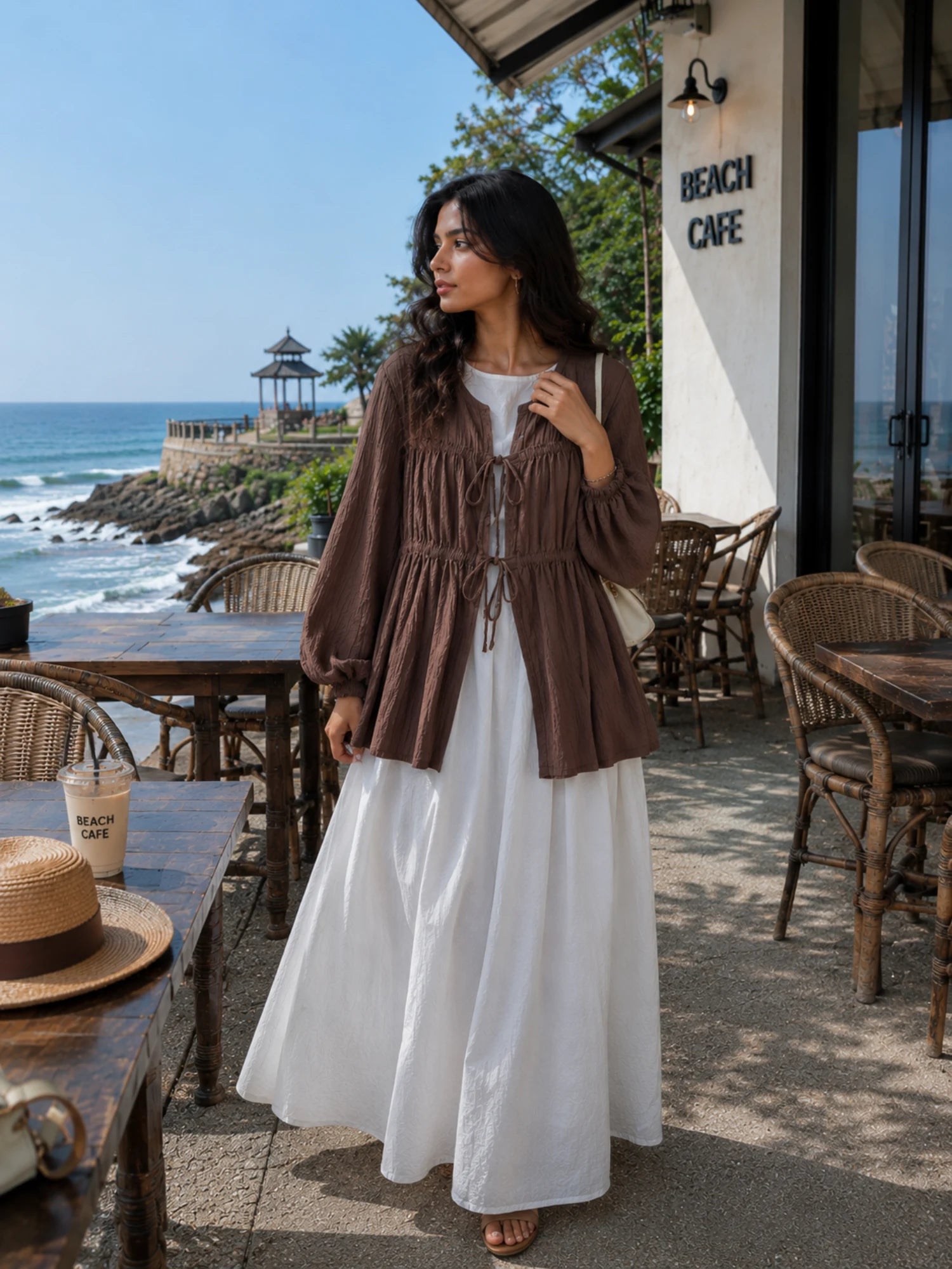 Chocolate Brown Cey Shrug with White Flared Maxi Gown | Yezwe Modest Wear showcasing a stylish outdoor setting