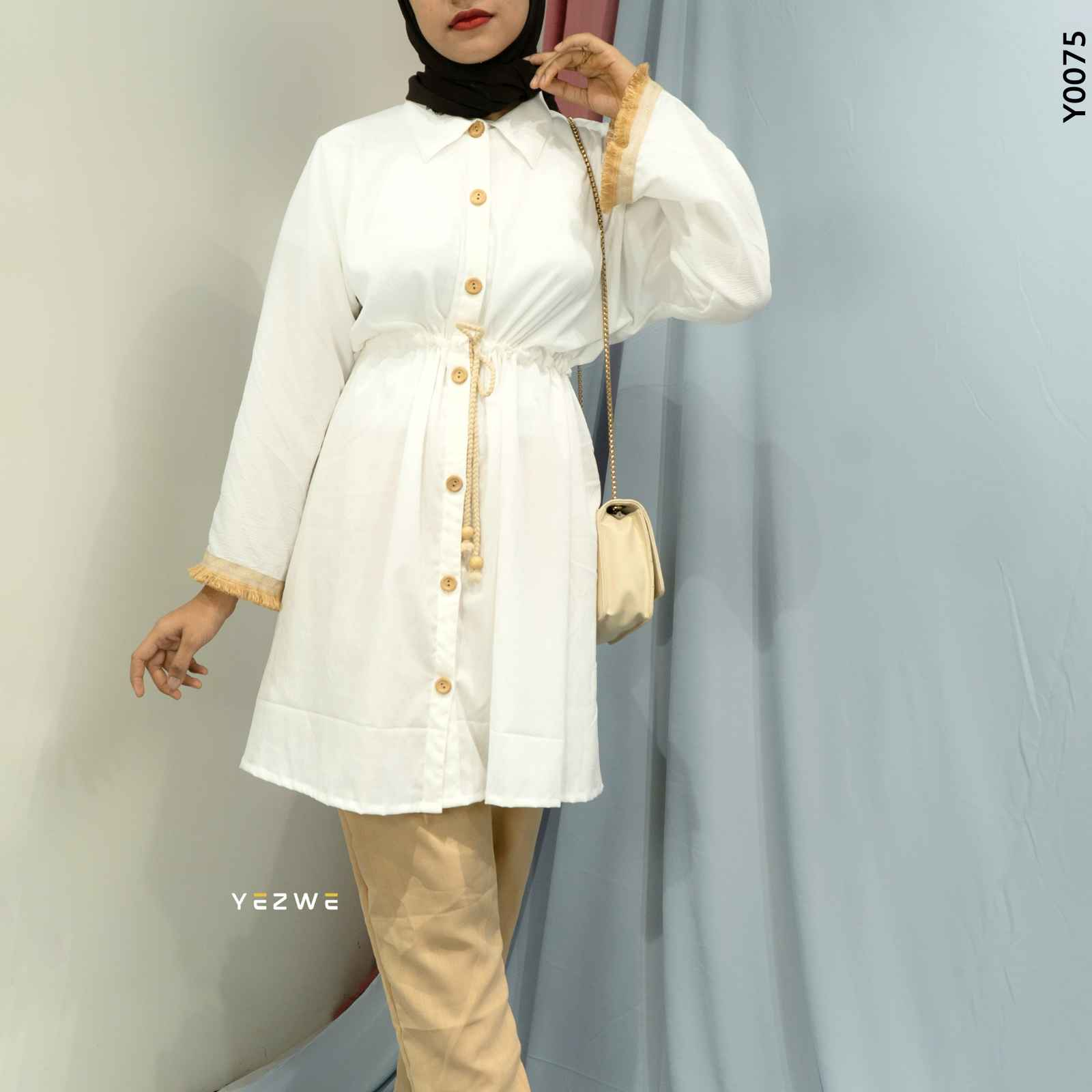 Yezwe modest wear co-ord set featuring a white button-up top and beige pants with stylish accents