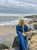 Yezwe modest wear dresses featuring a blue maxi dress with long sleeves, suitable for beach outings