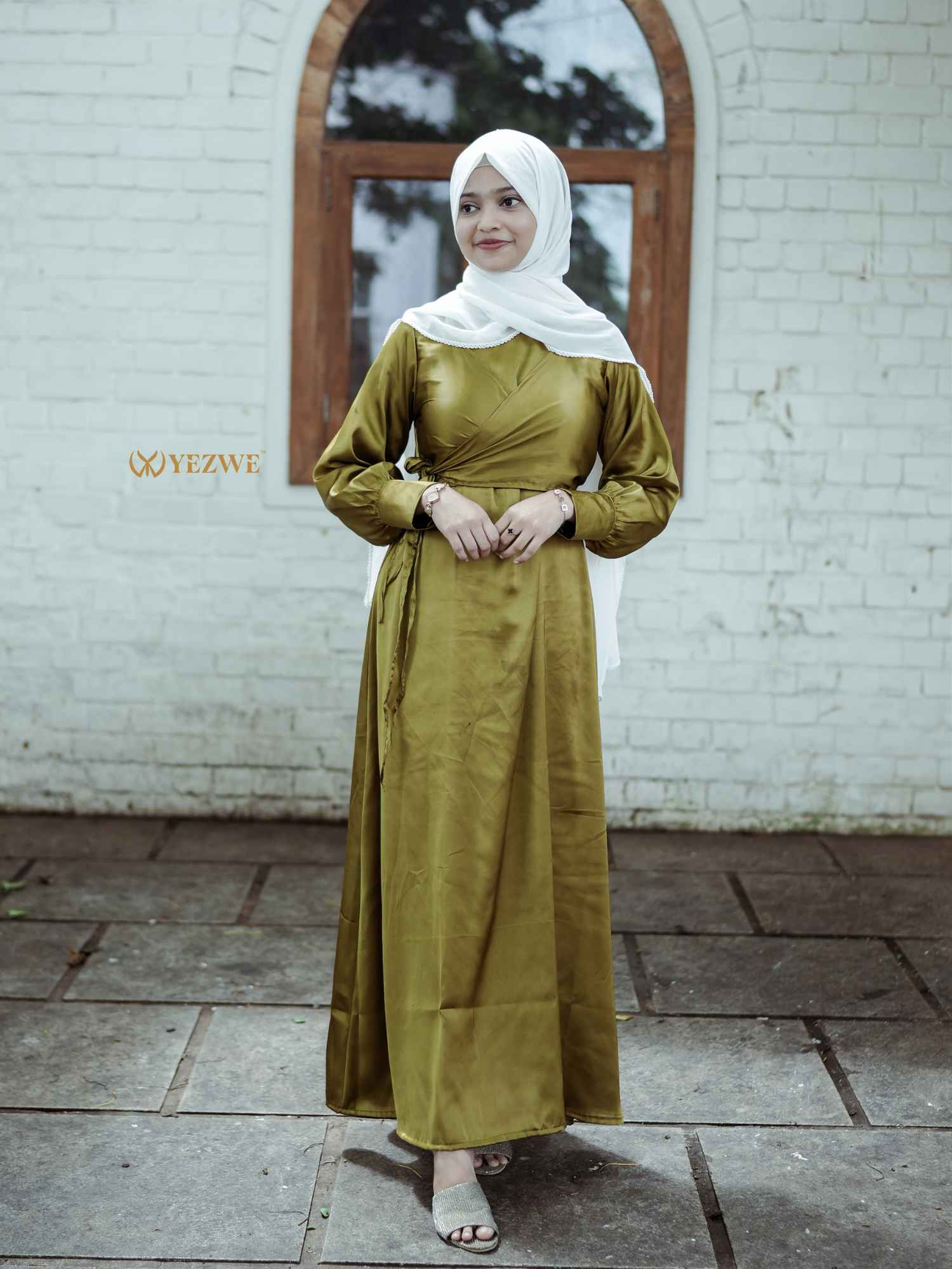 Elegant Yezwe modest wear flowing maxi dress in olive green, perfect for special occasions and everyday wear
