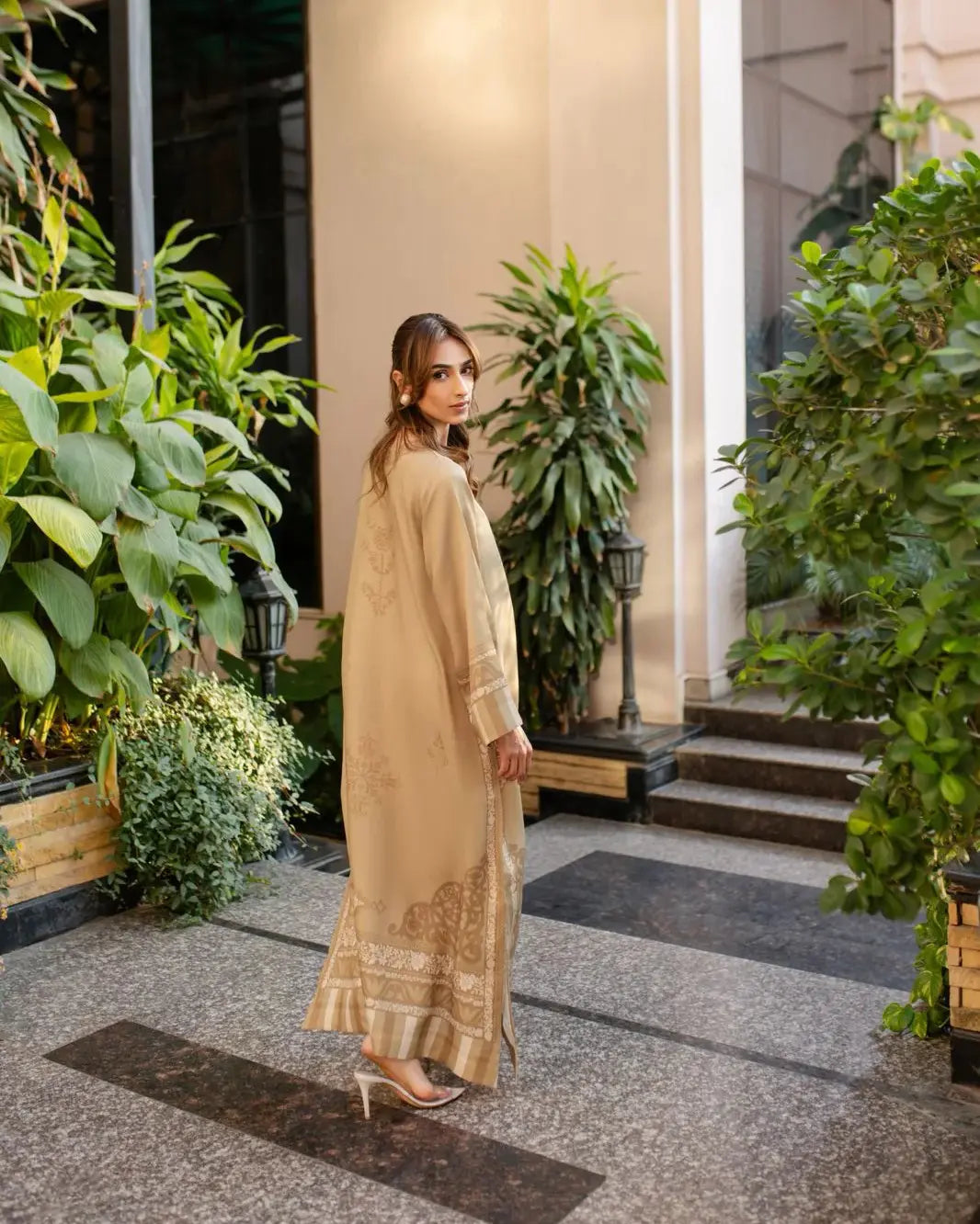 YEZWE Modest Wear Golden Jalabiya Full Length Dress featured in a stylish outdoor setting