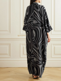 YEZWE modest wear kaftan dress with black and gray abstract swirl pattern and loose fit