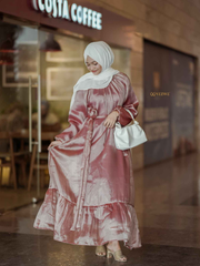 Elegant Yezwe modest wear maxi dress in soft pink with tiered hem and trendy sleeves