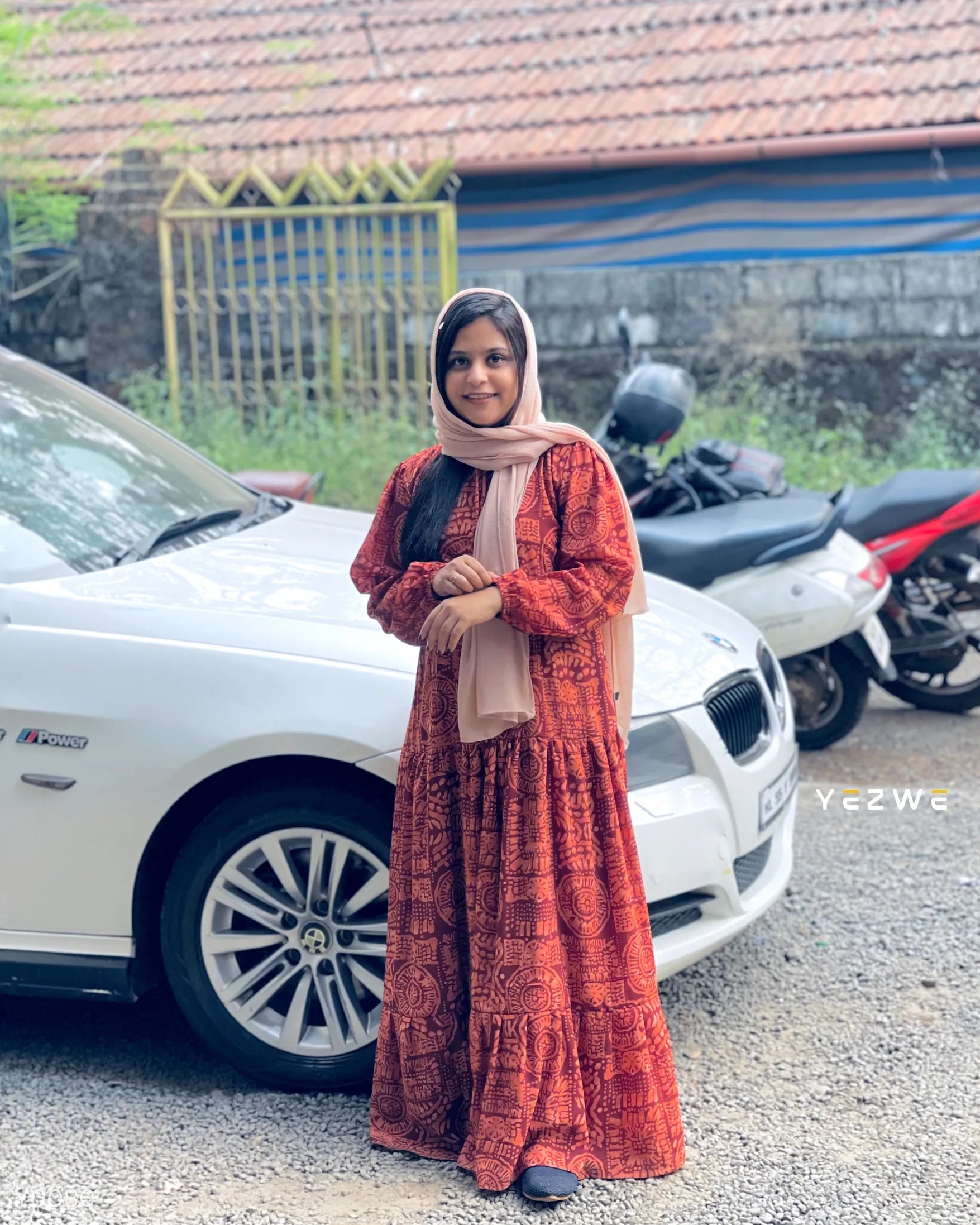 Yezwe Modest Wear Maxi Dress in Rust with Long Sleeves and Flowing Skirt for Comfortable Style