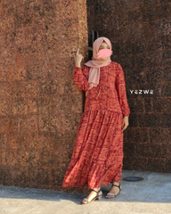 Yezwe Modest Wear Maxi Dress in rich red pattern with long sleeves and flowy silhouette