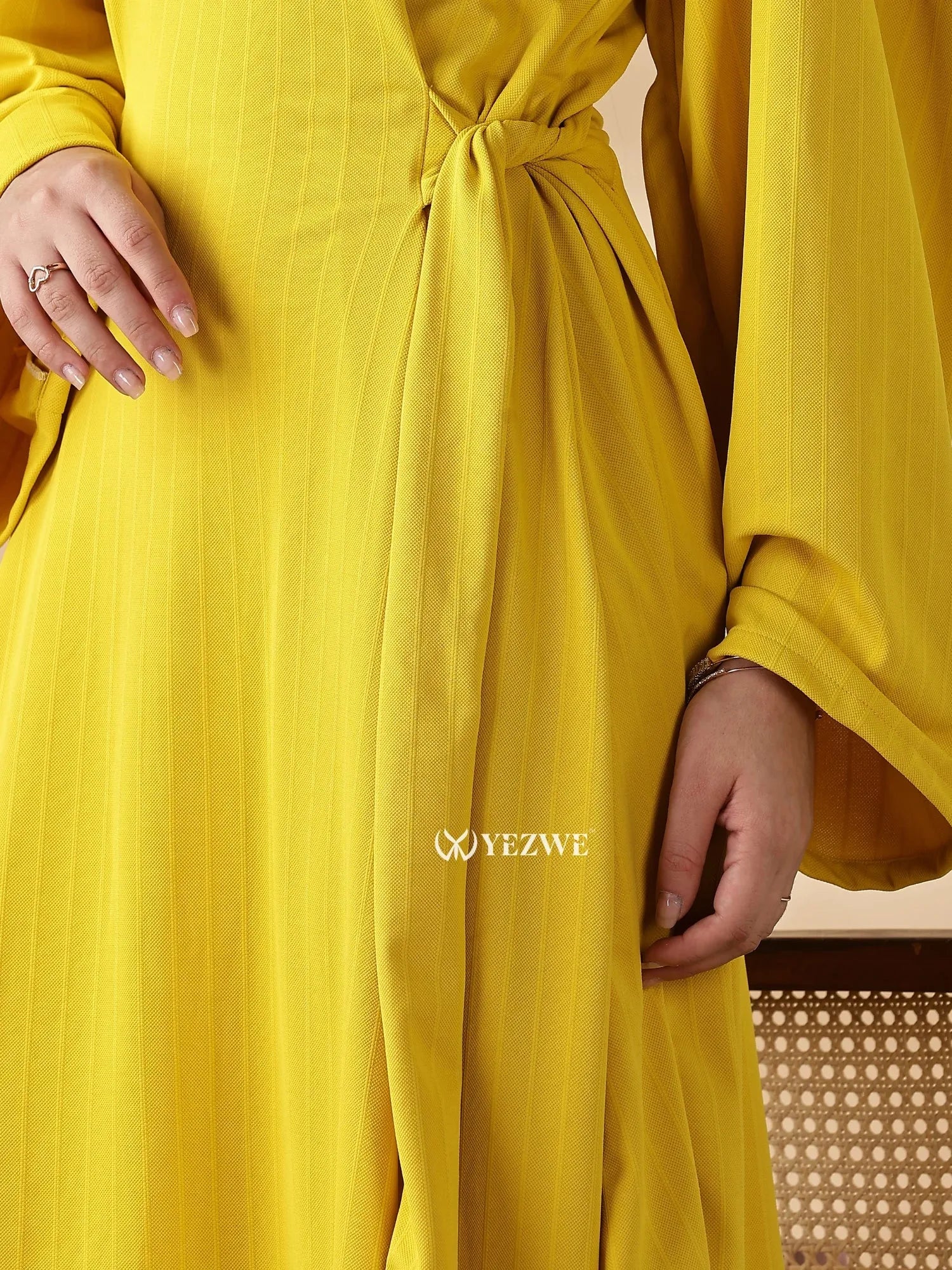 Elegant modest yellow maxi dress from YEZWE with a tied waist detail for a flattering silhouette