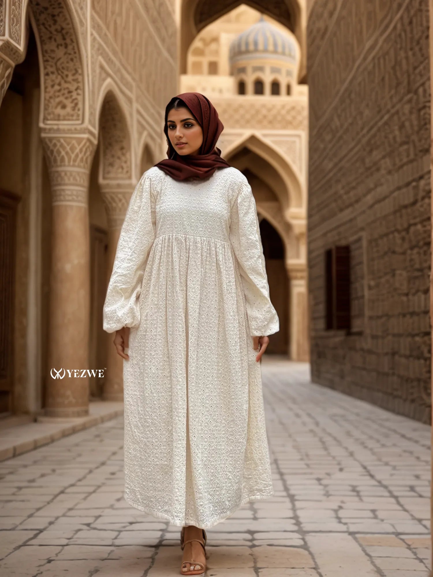 Elegant Off White Maxi Dress by Yezwe with long sleeves and a flowy design in a historic setting
