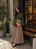 YEZWE Olive Green Bell Sleeve Blouse & Leopard Print High Waist Maxi Skirt Two-Piece Set worn outside a cafe