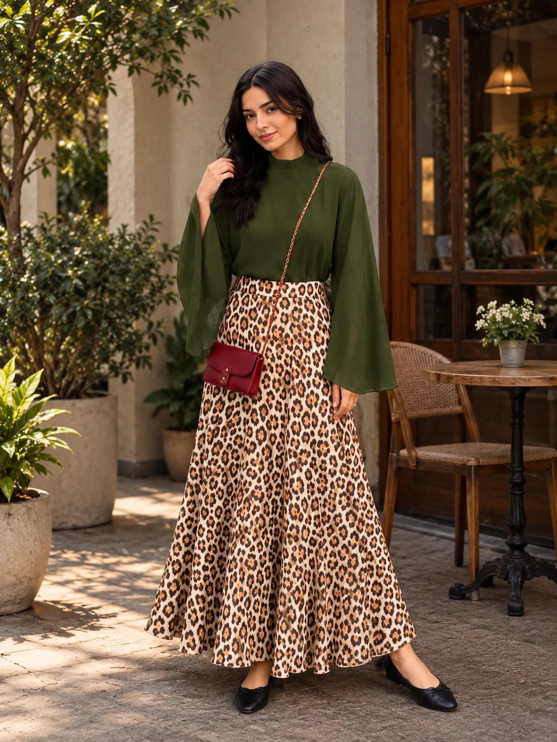 YEZWE Olive Green Bell Sleeve Blouse & Leopard Print High Waist Maxi Skirt Two-Piece Set in a stylish outdoor setting