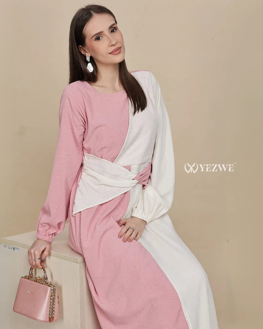 Pastel pink maxi dress by YEZWE featuring long sleeves and a stylish wrap design