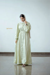 Elegant pista green jacquard dress by Yezwe featuring a button-down design and puff sleeves