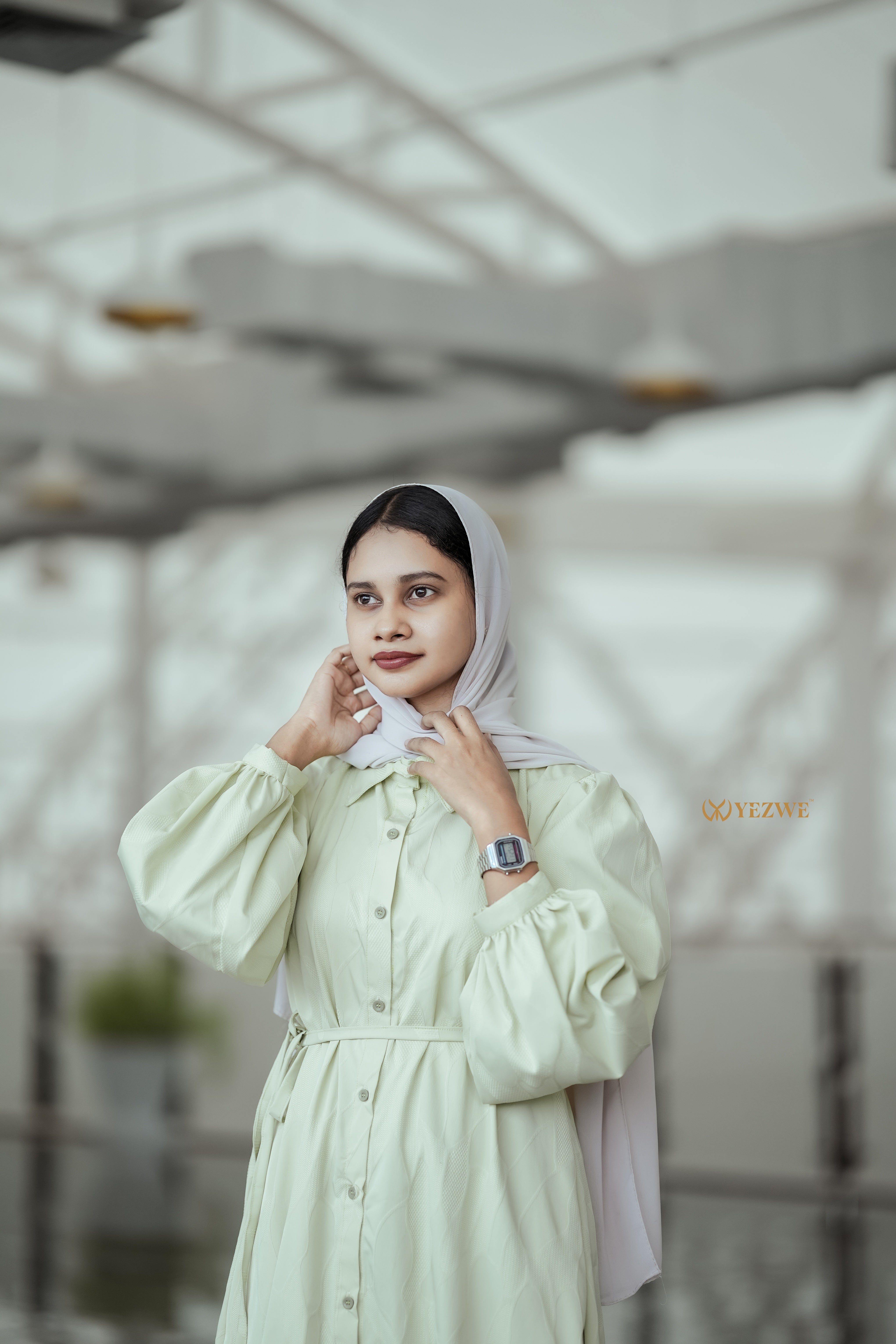 Elegant Yezwe pista green jacquard dress with puff sleeves and a cinched waist for stylish comfort