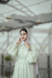Elegant Yezwe pista green jacquard dress with puff sleeves and a cinched waist for stylish comfort