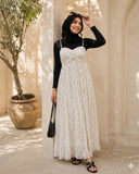 YEZWE Polka Dot Georgette Maxi Dress With Black Inner | Modest Wear worn by a woman in a sunny setting